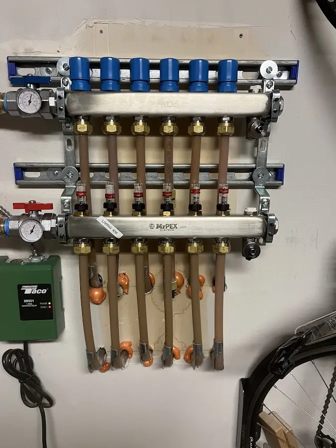 Plumber performing Water Heater Repair at a residential property in Redlands